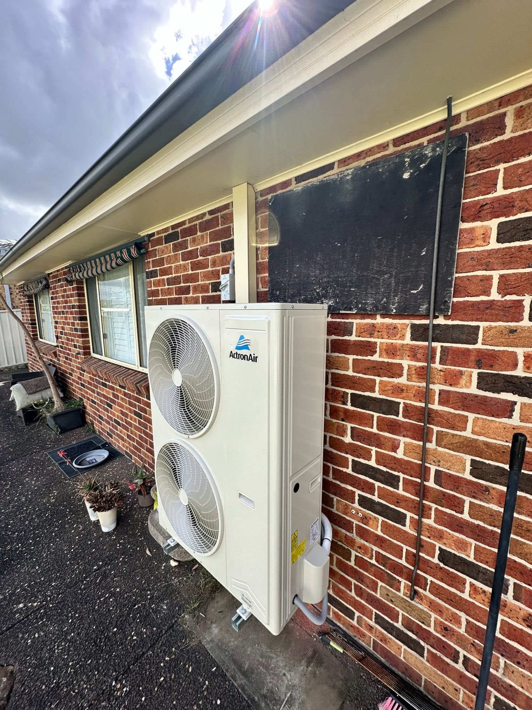Outdoor condenser install — HR Air, Newcastle & Hunter